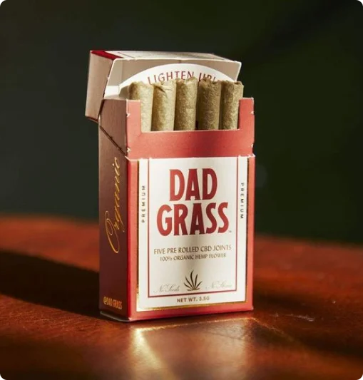 cigarette style pre roll box in tuck top style and red color printing and custom branding and product copy details with pre-rolls showed places inside the box