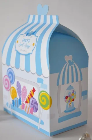 Custom-printed gable box styled as a vintage candy shop with pastel blue and white striped roof, heart-shaped handle, and branded label reading “Emily’s Sweet Shoppe”; front panel features colorful illustrations of lollipo