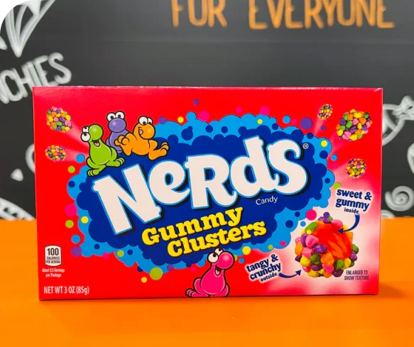 Nerds Gummy Clusters box with bold branding, cartoon characters, and candy image printing on red and blue colored packaging.